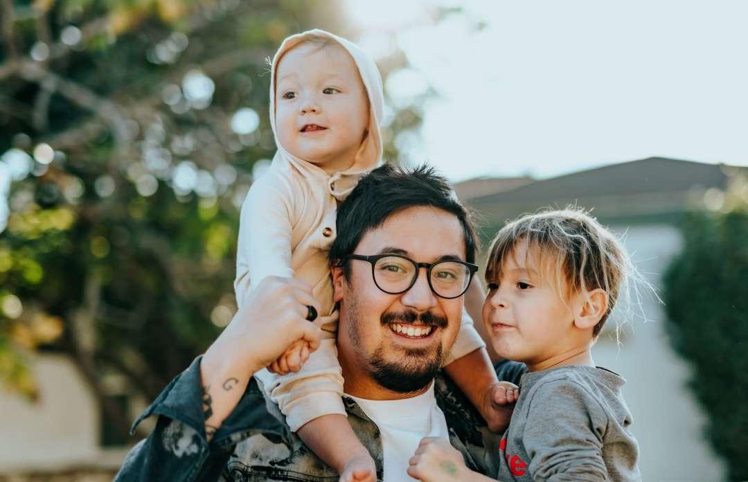 Happy father with children